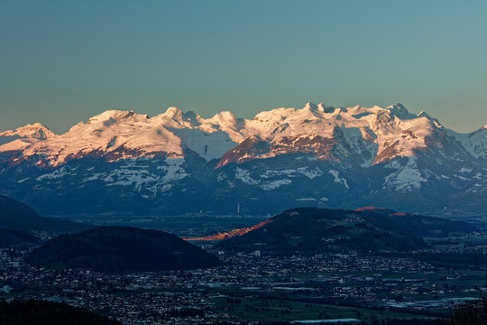 Feldkirch, Rhine valley, Austria - sunrise over Rhine valley with snowy peaks of  Apenzell Alps in Switzerland