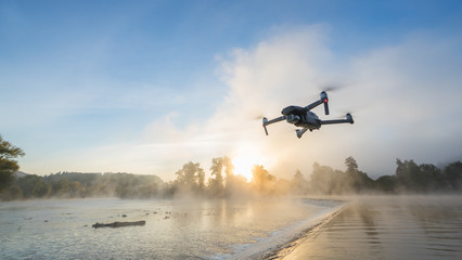 Drone copter with digital camera, blur background