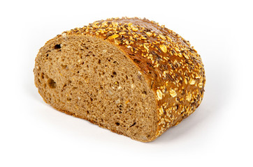 a half dark german bread on white background