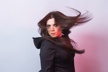 Woman as witch. Halloween and carnival concept on white background