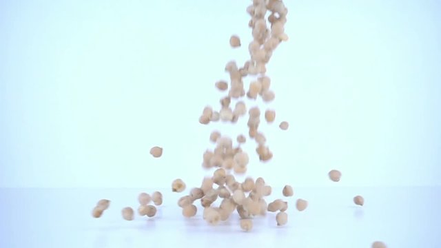 Peas falling in slow motion (20x speed).
