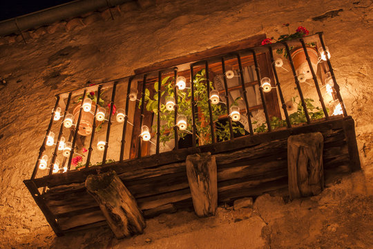 Old balcony, iluminated only by candles. La noche de las velas de Pedraza, Segovia