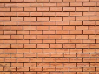 red brick wall texture background is repetition. can be used montage for your product or graphic design wallpaper. free space for your text