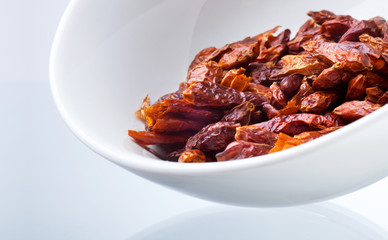 dried chili peppers, isolated on white