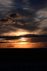 Sunset sky with clouds and black copy space for vertical instagram stories
