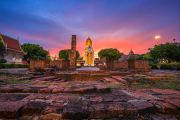Buddha statue at sunset are Buddhist temple at Wat Phra Si Rattana Mahathat also colloquially...