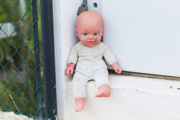 Homeless children, orphans and child abuse - Broken and macabre dolls.