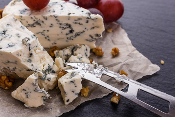 delicious blue cheese on wooden rustic background