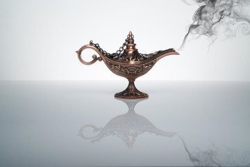 Magic Lamp with smoke art on white background