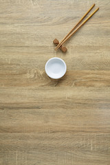 Chopsticks and white bowl