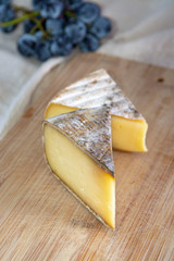 French hard cow or goat cheese Tomme or Tome, produced in French Alps