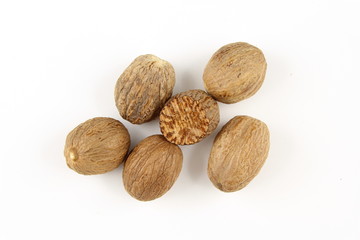 nutmeg seeds isolated on a white background