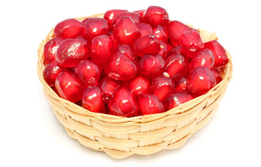 Red Pulp of pomegranate fruit on bamboo basket