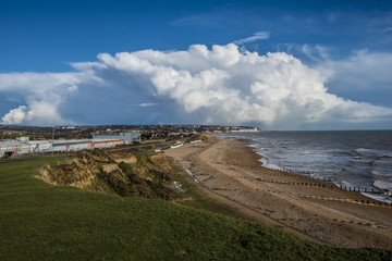 Distant thunderstorm clouds over Hastings in East Sussex, England