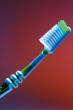 Plastic green with blue toothbrush