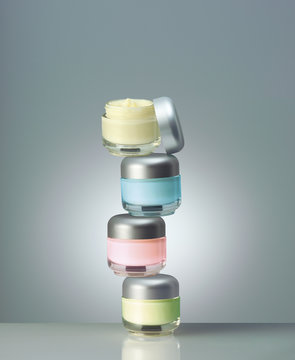 Colorful jars with cosmetics