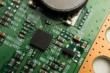 A complex PCB mounted board with surface mount electronic parts