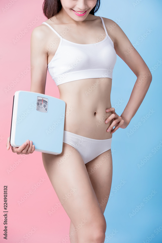 Poster woman take weight scale