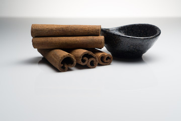 Cinnamon and Anise on white background isolated