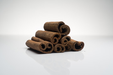 Cinnamon and Anise on white background isolated