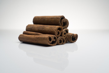 Cinnamon and Anise on white background isolated