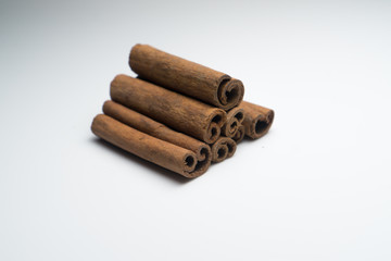 Cinnamon and Anise on white background isolated