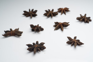 Cinnamon and Anise on white background isolated