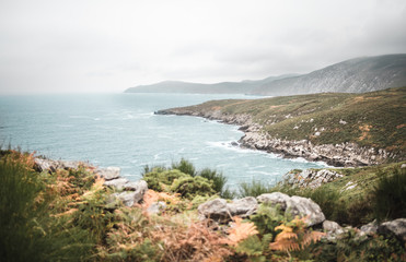 Fototapeta na wymiar Nice view over coastline in Galicia Spain on a day with blue sea