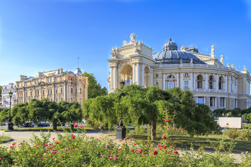 Park with roses near famous opera house of Odessa, Ukraine