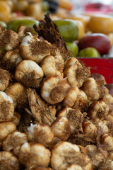 Bunch of smoked garlic on french village market