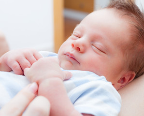 Cute little baby boy sleeping.