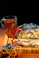 Traditional German Autumn and Christmas cake, berries and tea as still-life