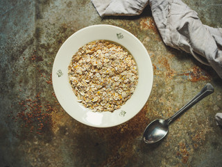 oat flakes (granola). Oatmeal. food background. top view and copy space
