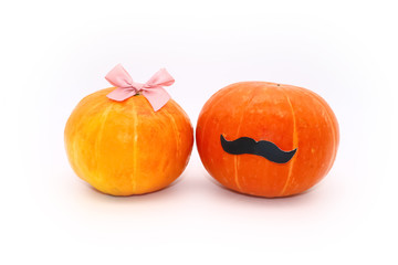 pumpkins he and she, close-up, isolated