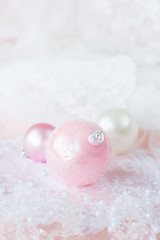 Fototapeta na wymiar White and pink Christmas balls