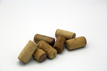 Group of wine corks isolated on white background.Room for text, copy space for text.