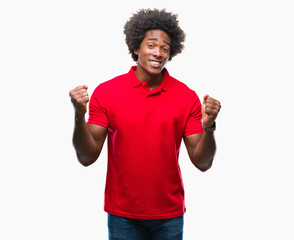 Afro american man over isolated background very happy and excited doing winner gesture with arms raised, smiling and screaming for success. Celebration concept.