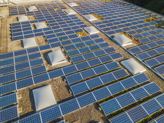 Aerial view of solar cells on rooftop for clean power generation in Switzerland, Europe