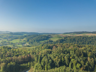 Fototapeta na wymiar Aerial view of forest panorama in rural landscape