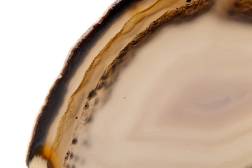 Macro mineral stone Yellow, brown Agate breed a white background