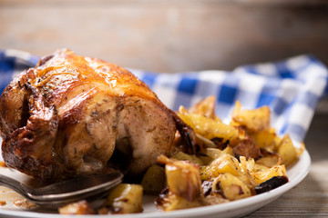 Roasted chicken with vegetables on a plate