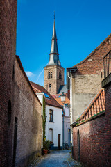 Fototapeta na wymiar Bicycle and traditional houses at the historic town of Bruges