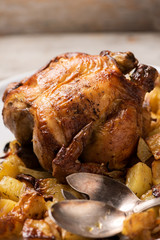 Roasted chicken with vegetables on a plate