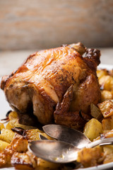 Roasted chicken with vegetables on a plate