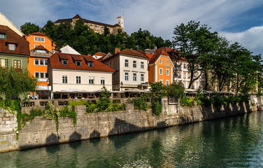 Fototapeta na wymiar Ljubljana, Slovenia. Cityscape view on Ljubljanica river canal in Ljubljana old town. Holidays in Slovenia.