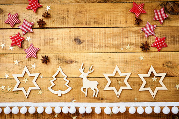 beautiful Christmas Eve background on an old table with wooden decorations