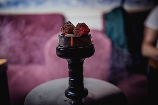 coals of hookah in the smoke