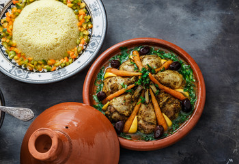 Chicken tajine with couscous and salad, morrocan cuisine
