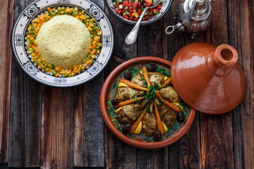 Slow cooked chicken with carrots, morrocan tajine, copy space.