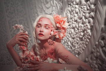 Young beautiful girl elf. Creative make-up and bodyart